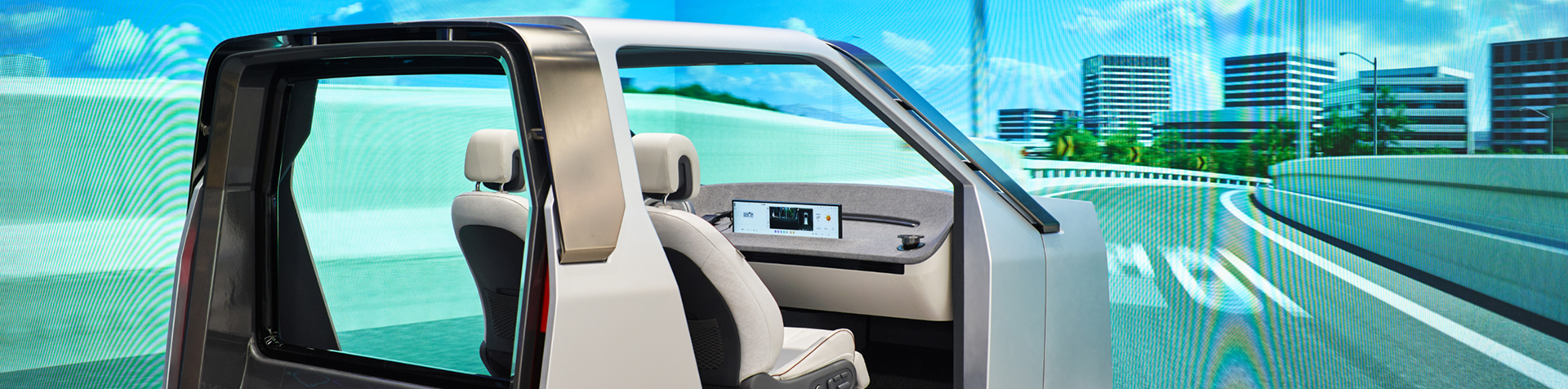 A stationary car cockpit that is part of a driving simulation