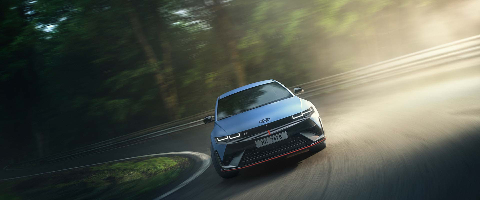 IONIQ 5 N driving on the winding road, front, 01