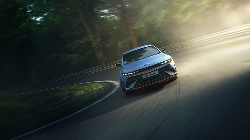 IONIQ5N_Exterior_Driving_Winding_Road_Front_01