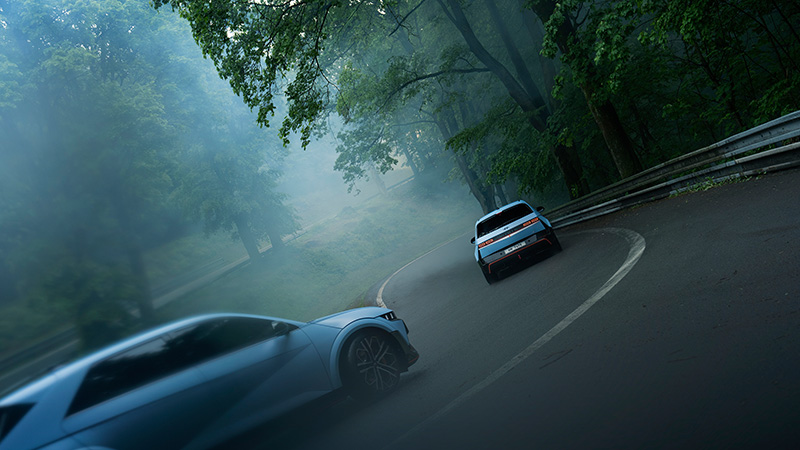 IONIQ5N_Exterior_Driving_Winding_Road_Rear_02
