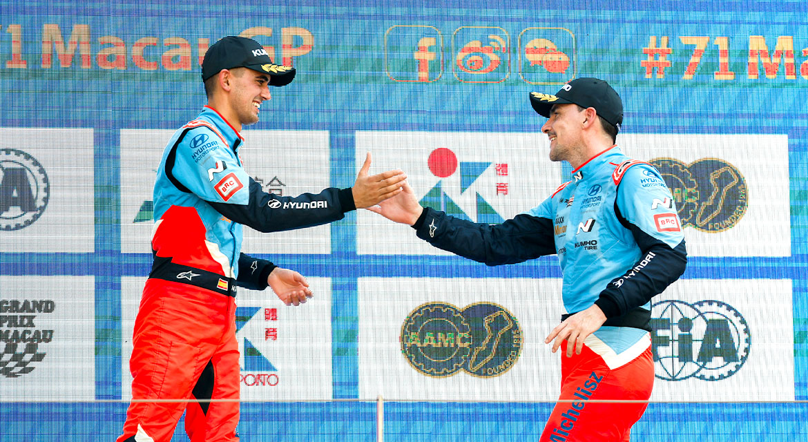 M. Azcona and N. Michelisz on podium