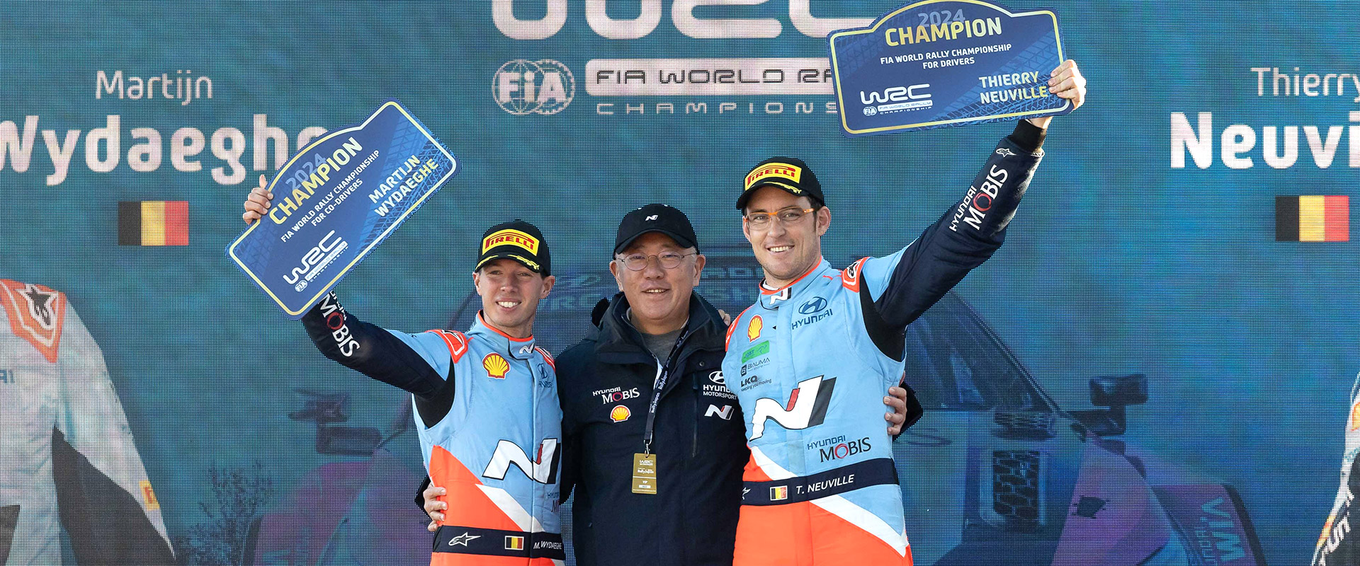 Thierry Neuville and Martijn Wydaeghe with Euisun Chung, Executive Chair of Hyundai Motor Group