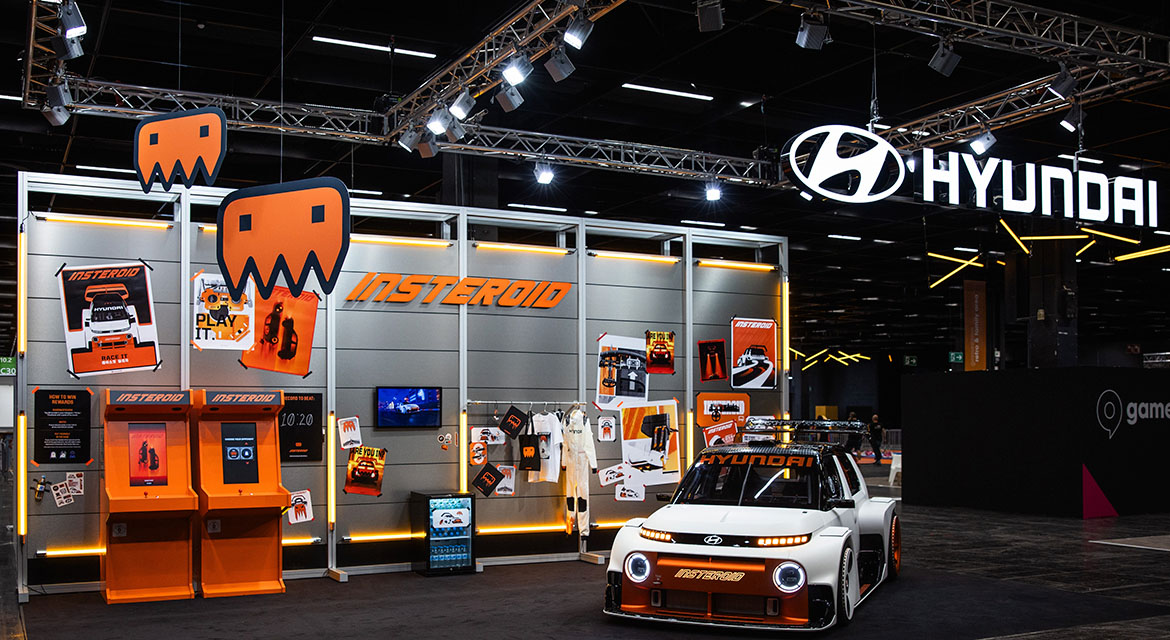 Hyundai Motor's booth in the ‘Retro & Family Area’ at gamescom 2025, featuring the INSTEROID concept car and its self-developed ‘INSTEROID Retro Arcade’ game.
