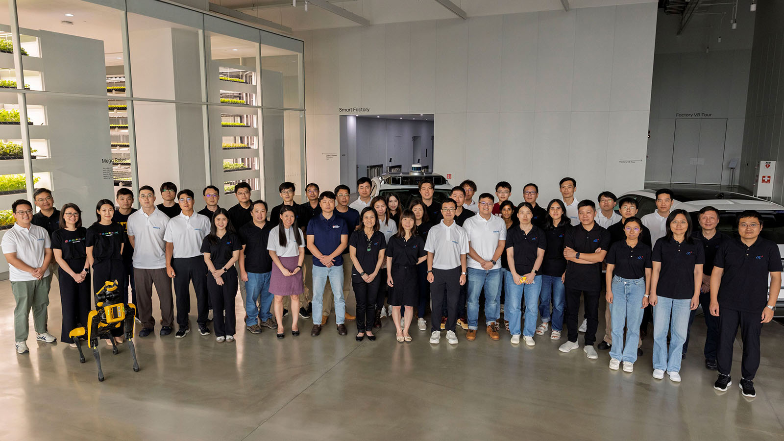 Seated row (from left to right) Prof Lam Kwok Yan, NTU, Associate Vice President (Strategies & Partnerships); Dr. Alpesh Patel , HMGICS, CIO; Dr. Hyun Sung Park, HMGICS, CEO; Prof Lim Keng Hui, A*STAR, Assistant CE, SERC; Dr David Low, A*STAR, CEO, ARTC / Standing row (from left to right): Prof Hu Guoqiang, NTU, Assistant Dean (Research), College of Engineering; A/Prof Moon Seung Ki, NTU, Corp Lab Co-Director; Dr.Jeongguk Min, Hyundai, Head of Manufacturing SW R&D Group; Dr. Louie Han, HMGICS, Head of Core R&D, Corp Lab Deputy Co-Director ; Mr Ethan Lim, EDB, Assistant VP, Mobility and Industrial Solutions, Alternate for Lim Tse Yong; Dr. Wang Wei, A*STAR, Corp Lab Deputy Co-Director