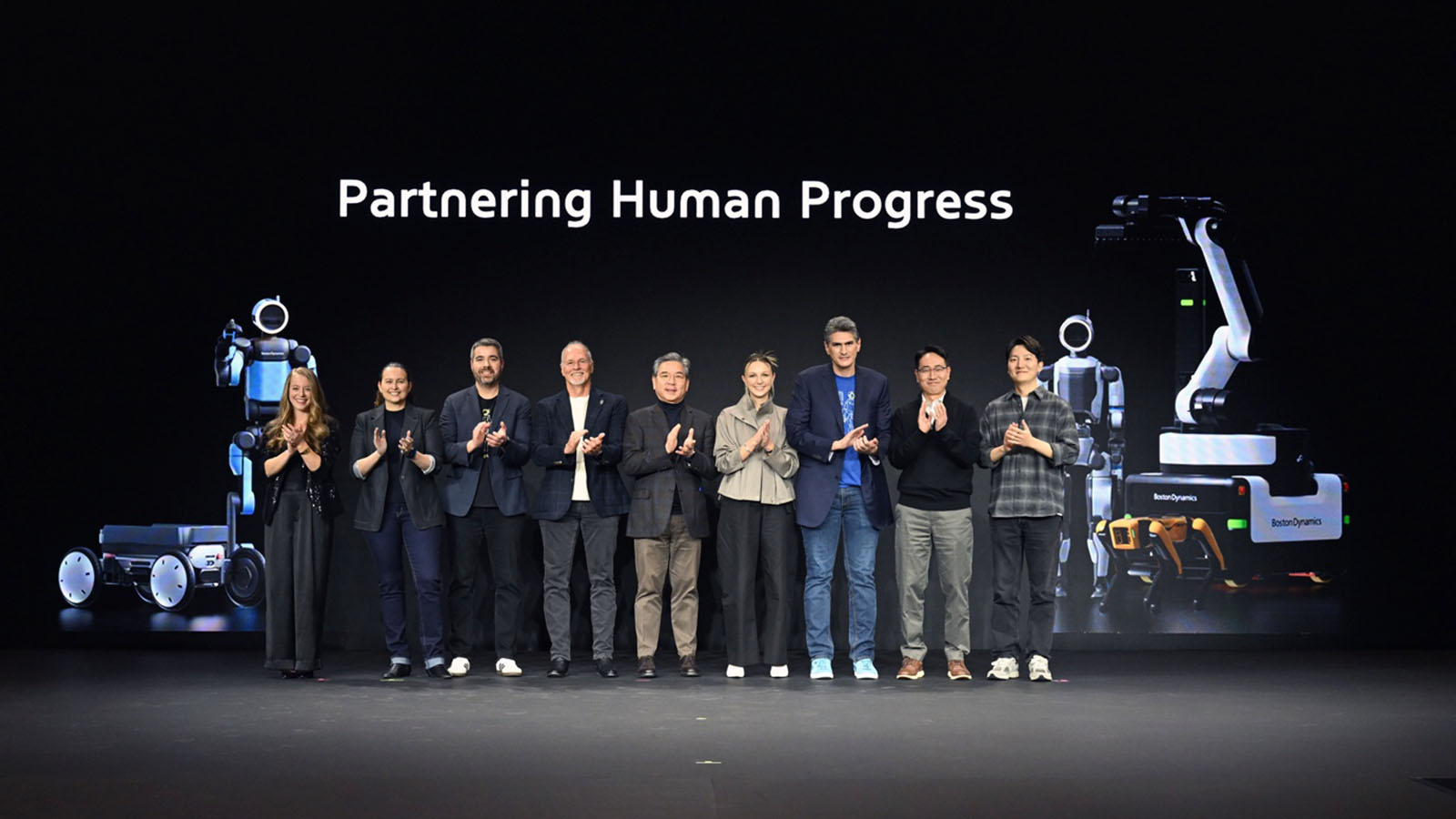 (From left) Merry Frayne, Director of Spot Product Management at Boston Dynamics; Carolina Parada, Head of Robotics at Google Deepmind; Alberto Rodriguez, Director of Atlas Behavior at Boston Dynamics; Robert Playter, CEO of Boston Dynamics; Jaehoon Chang, Vice Chair of Hyundai Motor Group; Aya Durbin, Humanoid Application Product Lead at Boston Dynamics; Zachary Jackowski, Vice President and General Manager of Atlas at Boston Dynamics; Woong Jae Lee, Vice President of Manufacturing Division at Hyundai Motor Group and Chief Innovation Officer of Boston Dynamics; Seunghyun Woo, Future Strategy Team Lead at Hyundai Motor Group