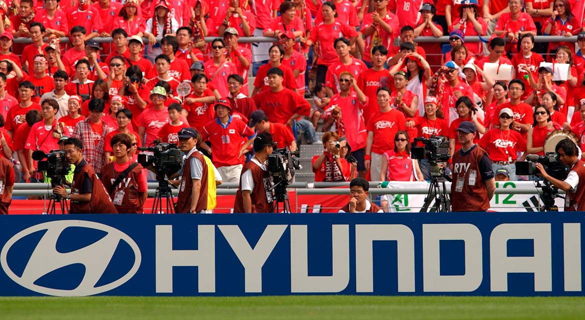 Fans cheer for the Korea Republic national team during the 2002 FIFA World Cup Korea/Japan™.