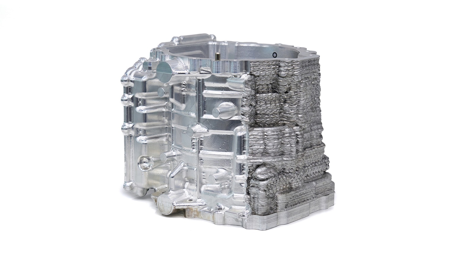 A sample metal component after partial CNC machining, emonstrating post-processing of an additively manufactured part.