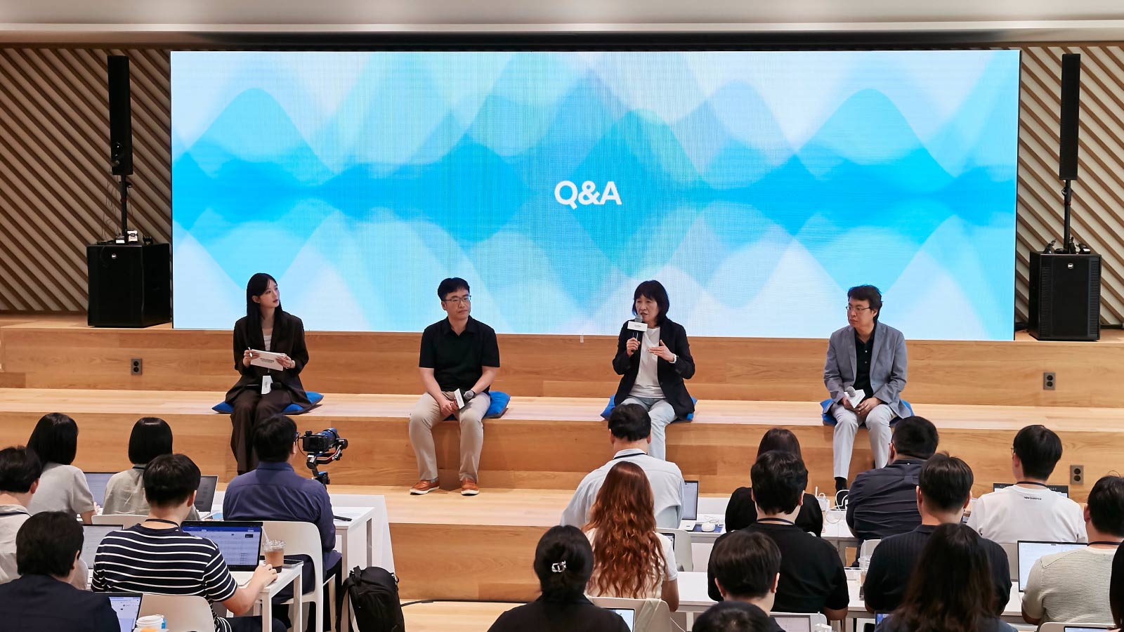 (From second to the left) Hwachang Sung, Team Leader of the Hyundai Motor and Kia AX PMO Division; Eunsook Jin, President and Head of ICT Management Division at Hyundai Motor Group; and Gunhan Park, Vice President and Head of the Machine Learning Lab, participate in a Q&A session.