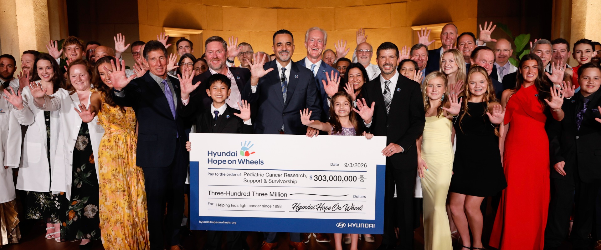 (center) Randy Parker, president and CEO, Hyundai Motor North America; (center right) Kevin Reilly, vice chair, Hyundai Hope on Wheels; Hyundai Hope on Wheels board of directors, national youth ambassadors, and grant recipients at the Andrew W. Mellon Auditorium in Washington, D.C., on Sept. 3, 2026 (Photo/Hyundai)