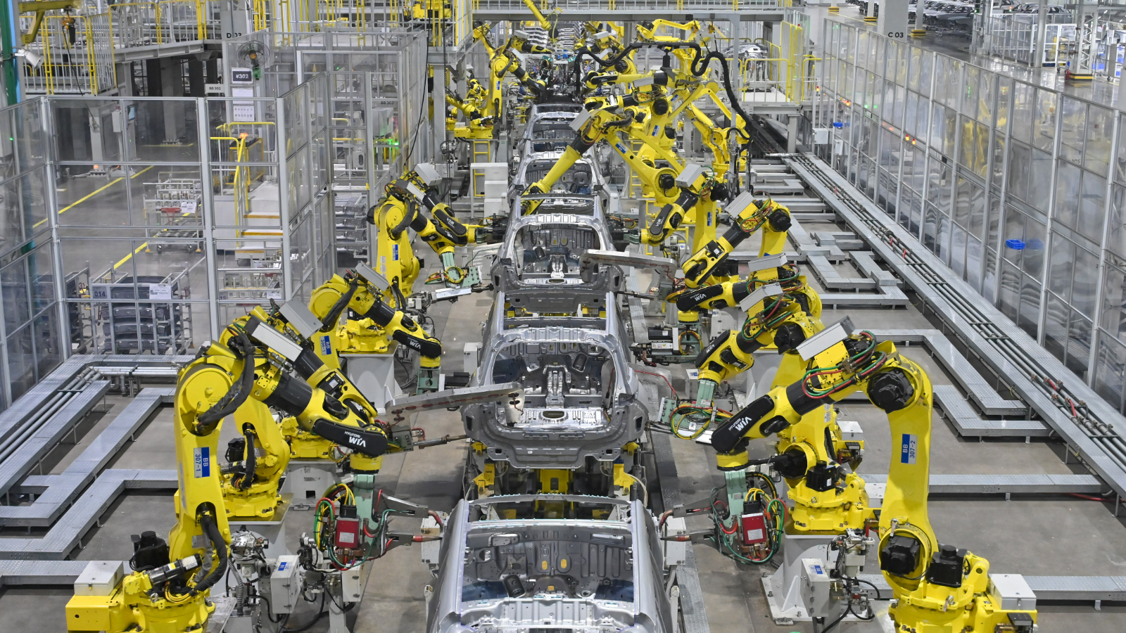 Industrial robots deployed in the body shop at the Pune plant performs welding work.